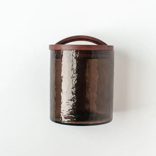 Brown glass canister with wood lid.